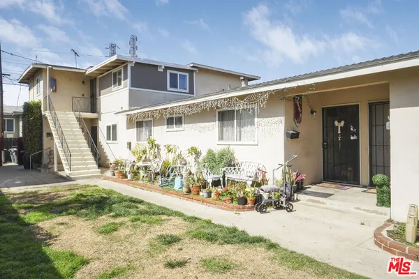 a front view of a house with a patio