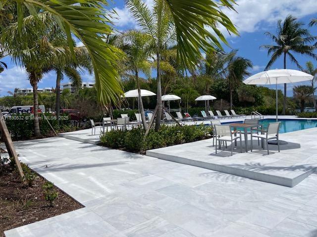 2560 South Ocean Boulevard, Unit 312 Palm Beach, FL 33480 - Photo 5 of 24 a view of a house with backyard and sitting area