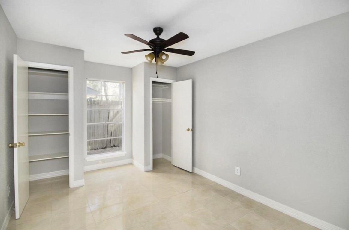 3022 Deer Valley Drive Spring, TX 77373 - Photo 17 of 34 a view of a livingroom with a ceiling fan and window