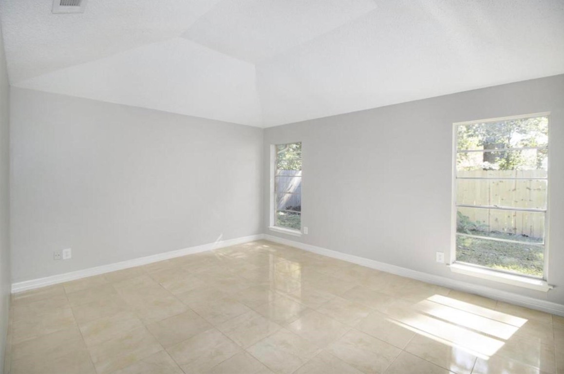 3022 Deer Valley Drive Spring, TX 77373 - Photo 21 of 34 a view of an empty room with a window