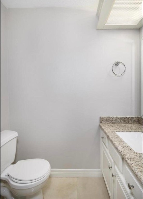 3022 Deer Valley Drive Spring, TX 77373 - Photo 23 of 34 a bathroom with a granite countertop toilet and a sink