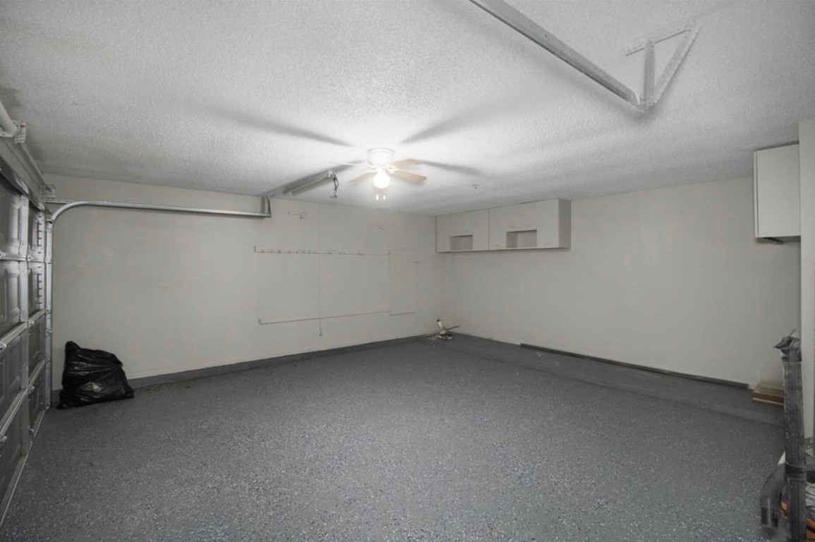 3022 Deer Valley Drive Spring, TX 77373 - Photo 24 of 34 an empty room with a ceiling fan and a window