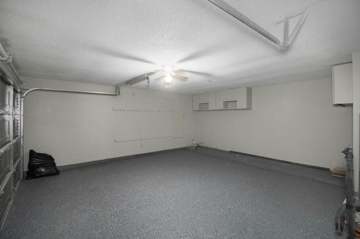 3022 Deer Valley Drive Spring, TX 77373 - Photo 25 of 34 an empty room with a ceiling fan and a window