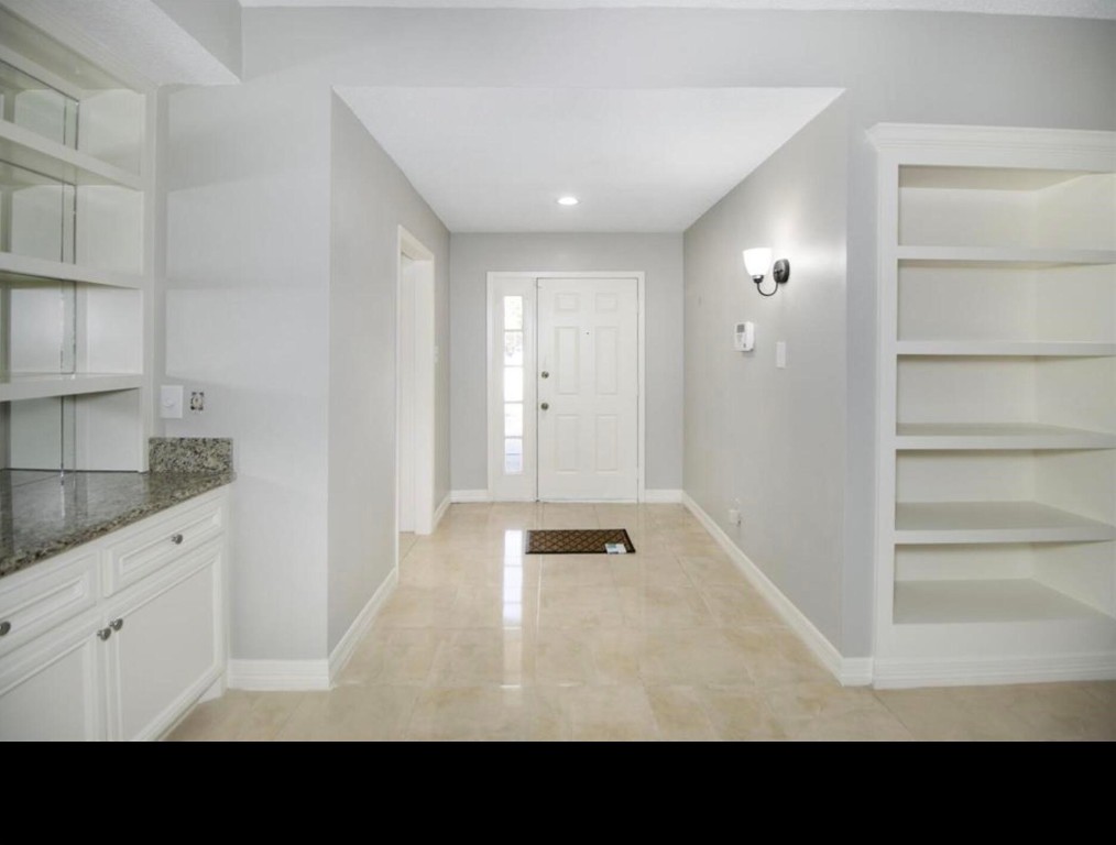 3022 Deer Valley Drive Spring, TX 77373 - Photo 26 of 34 a view of an empty room with cabinet and entryway
