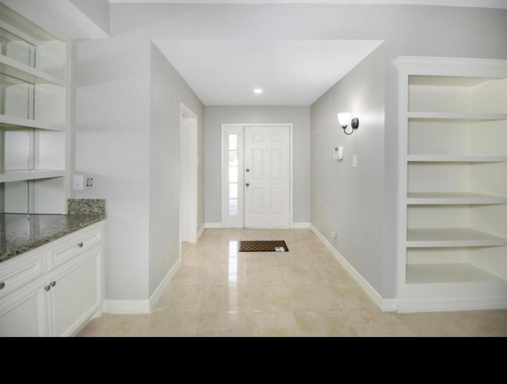 3022 Deer Valley Drive Spring, TX 77373 - Photo 27 of 34 a view of an empty room with cabinet and entryway