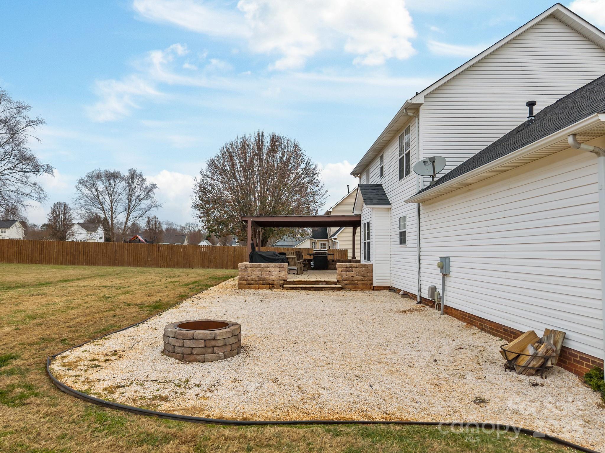 949 Cress School Road Salisbury, NC 28147 - Photo 27 of 46 a view of a house with backyard