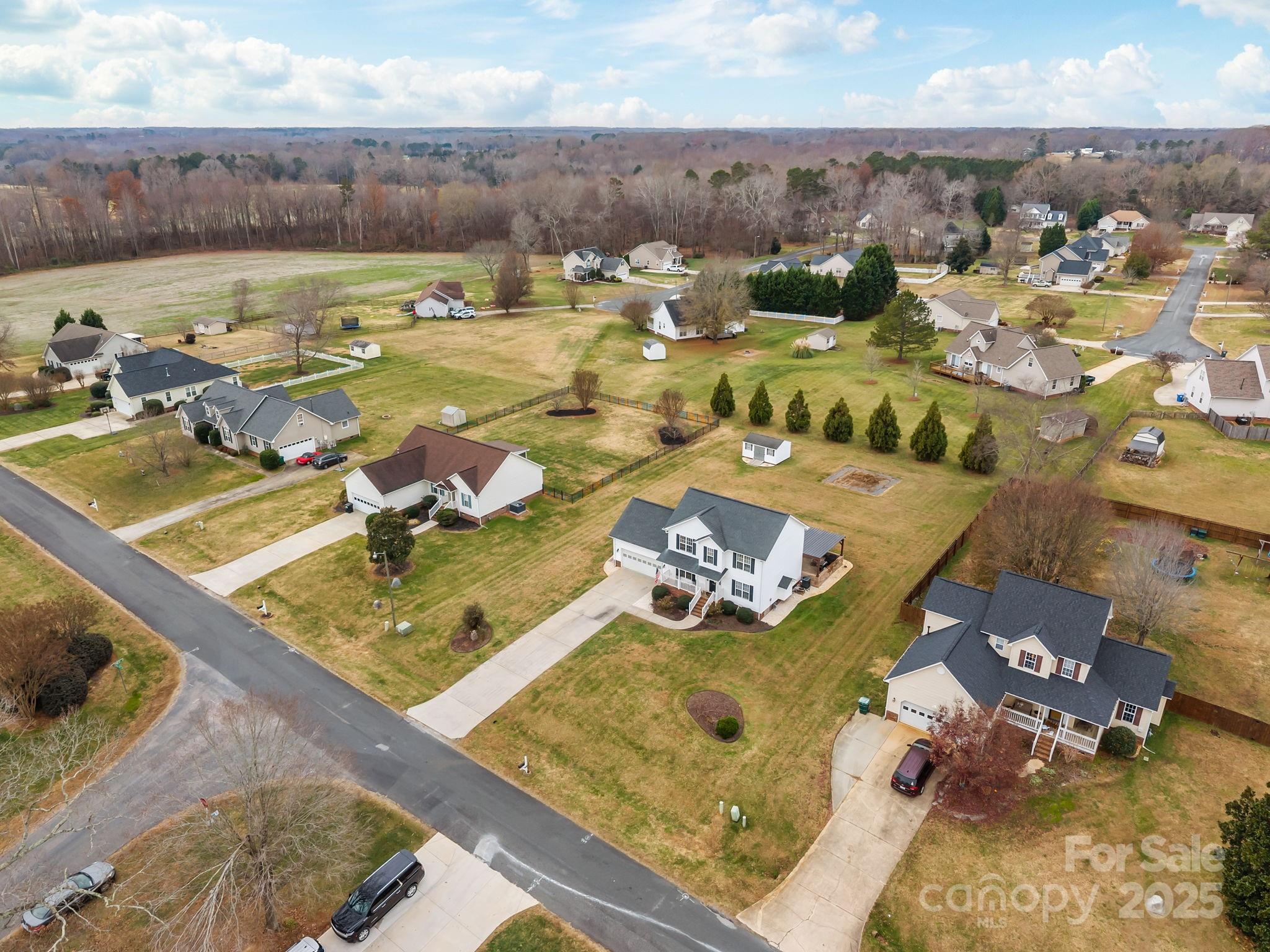 949 Cress School Road Salisbury, NC 28147 - Photo 34 of 46 an aerial view of a house with a swimming pool