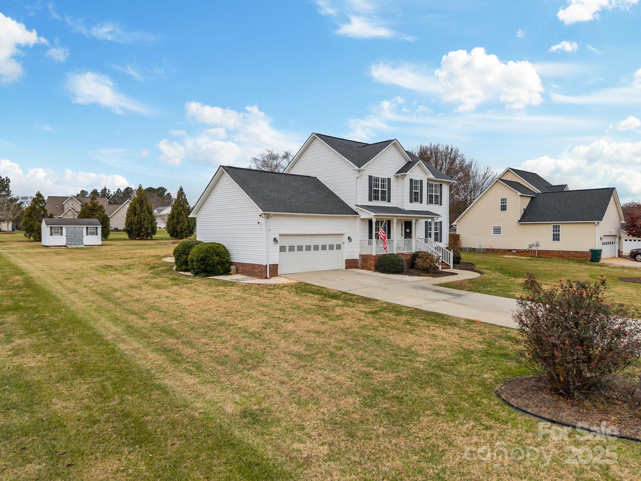 949 Cress School Road Salisbury, NC 28147 - Photo 42 of 46 a view of a house with a yard