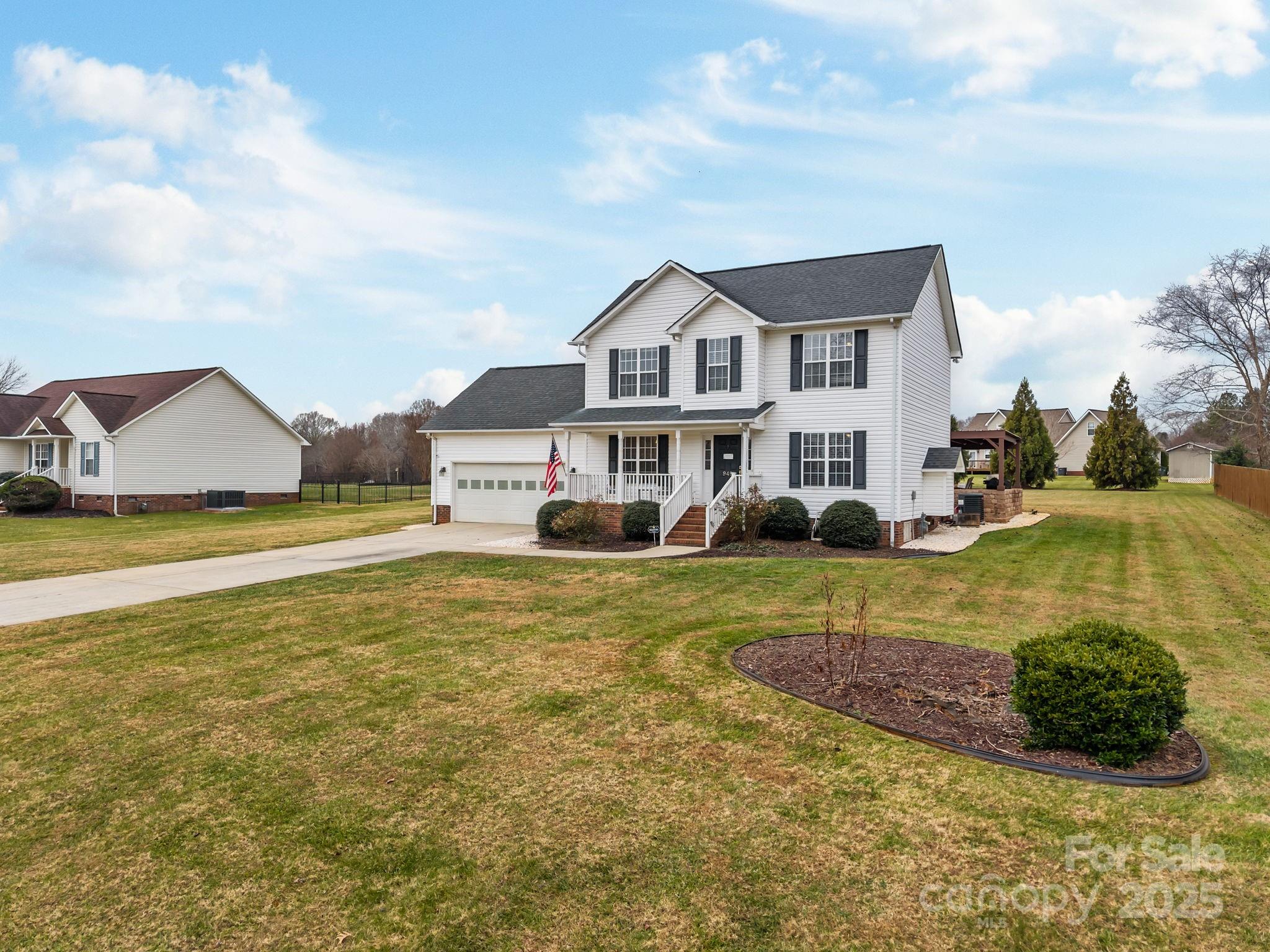 949 Cress School Road Salisbury, NC 28147 - Photo 43 of 46 a view of a house with a big yard and large trees