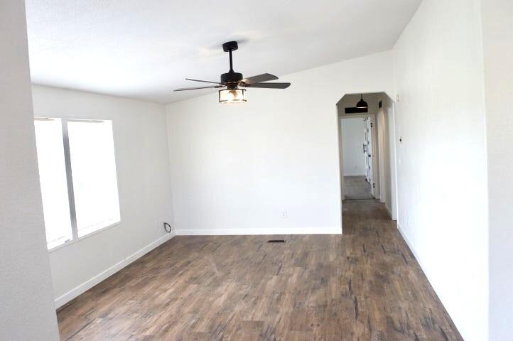 268 County Road Norwood, CO 81423 - Photo 8 of 28 wooden floor in a hall with a window