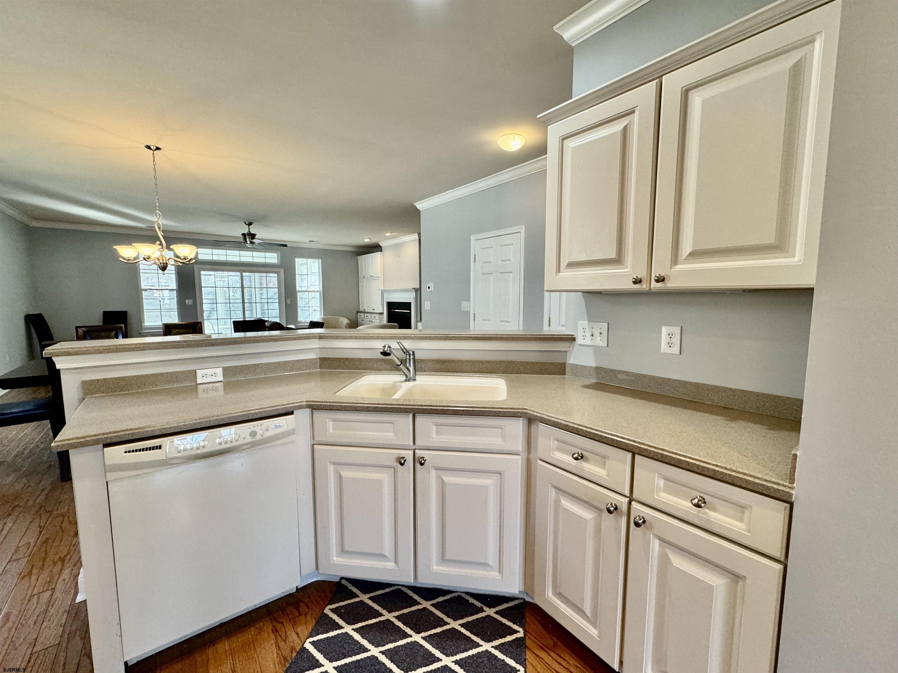 30 Wordsworth Street Galloway Township, NJ 08205 - Photo 11 of 46 a kitchen with white cabinets appliances and a sink