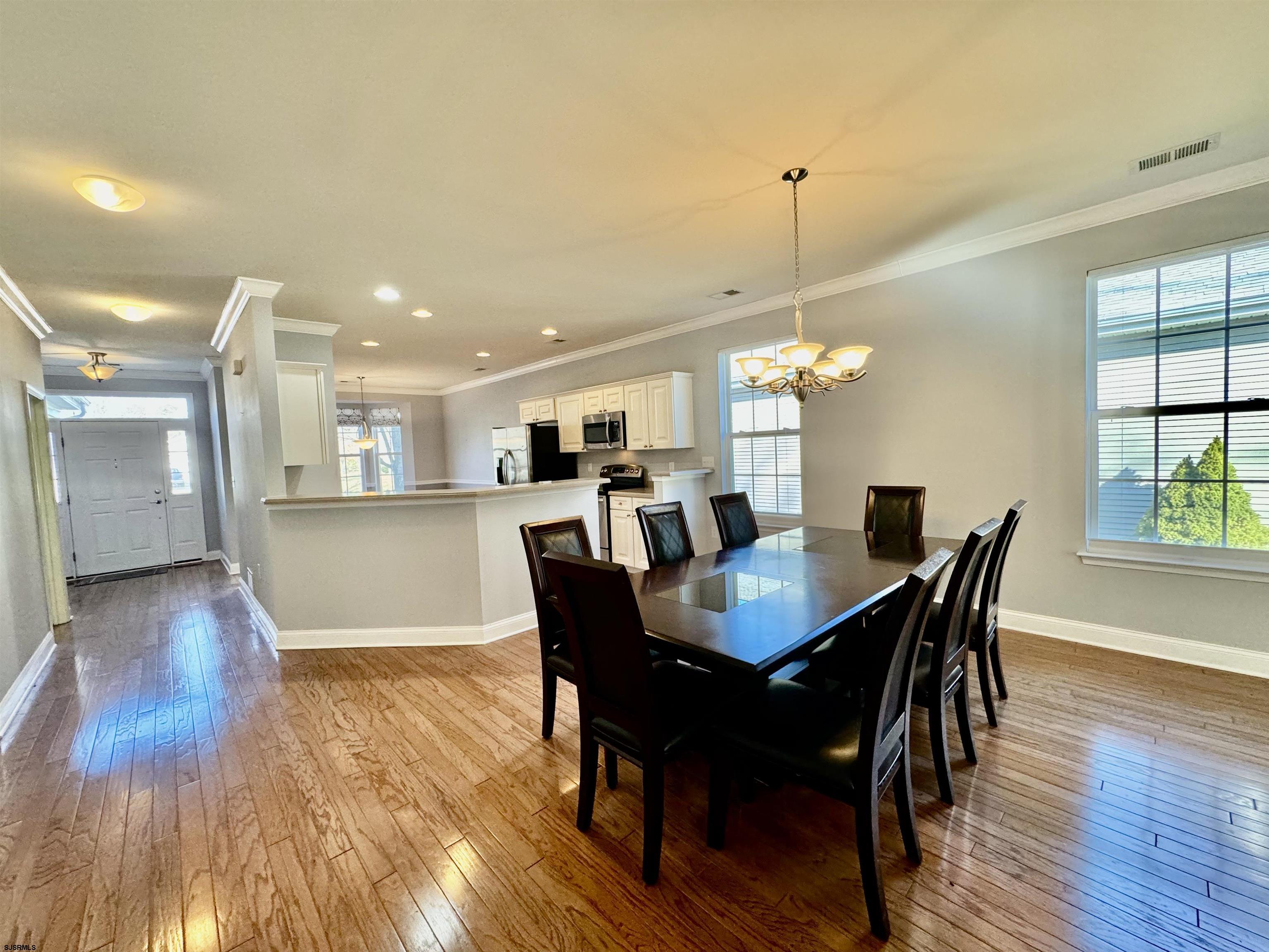 30 Wordsworth Street Galloway Township, NJ 08205 - Photo 13 of 46 a view of a dining room with furniture window and wooden floor