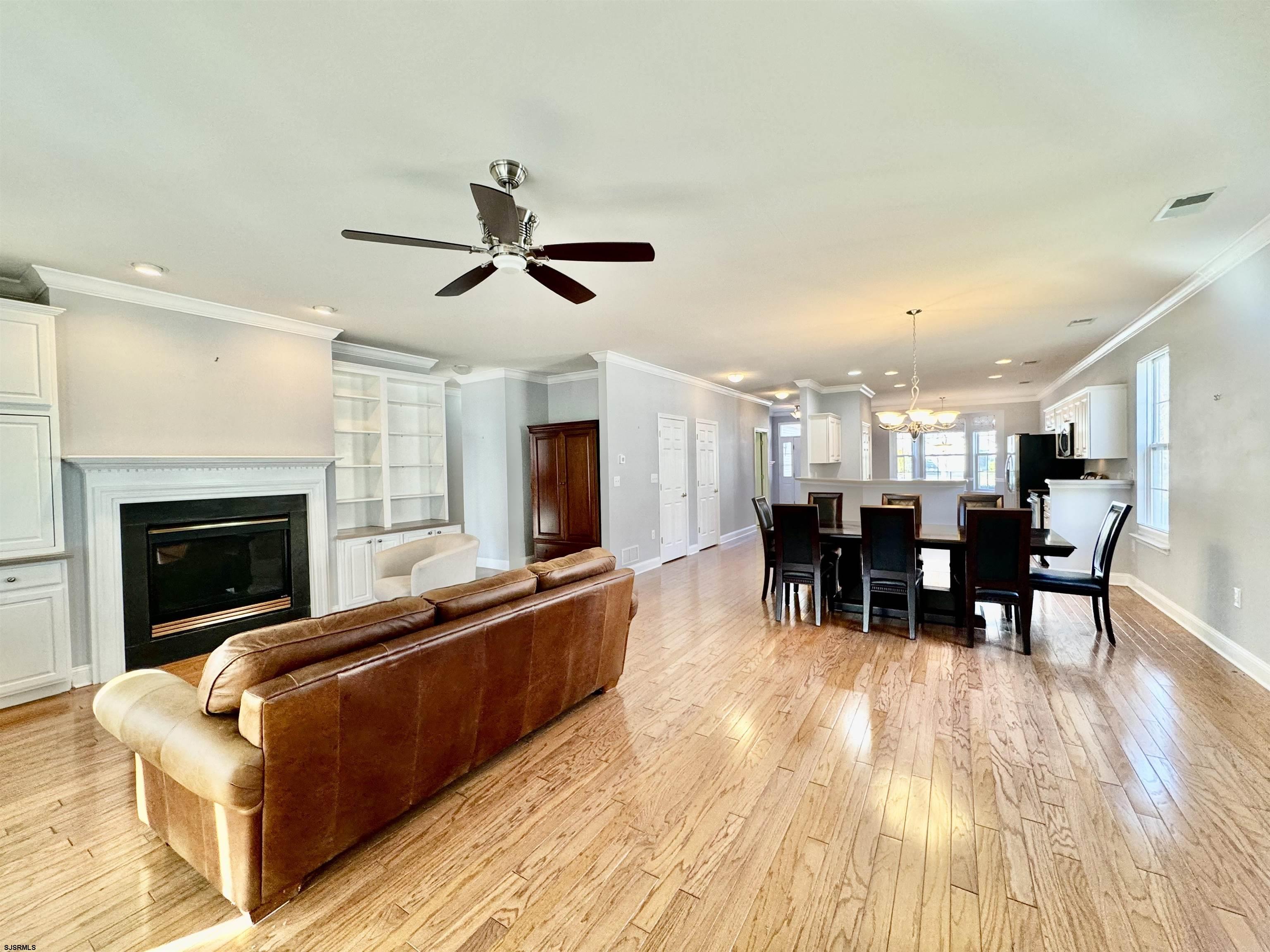 30 Wordsworth Street Galloway Township, NJ 08205 - Photo 15 of 46 a living room with furniture a fireplace and a flat screen tv