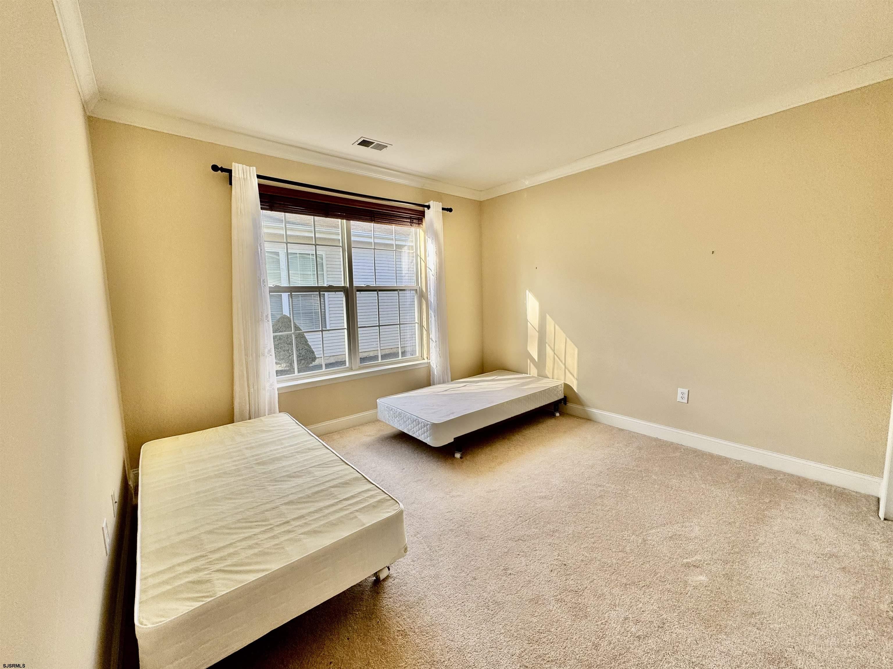 30 Wordsworth Street Galloway Township, NJ 08205 - Photo 25 of 46 a bedroom with a bed and a window