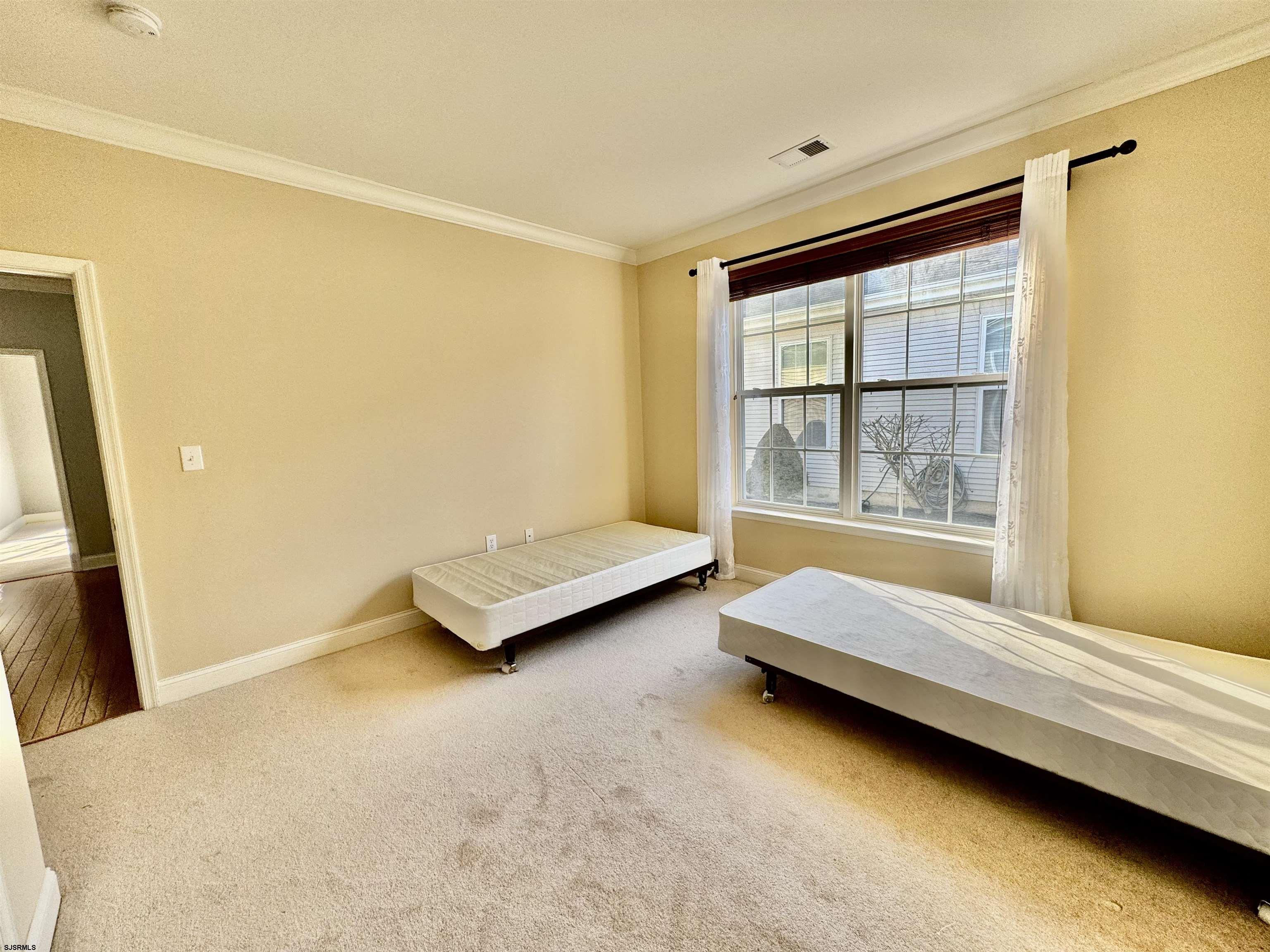 30 Wordsworth Street Galloway Township, NJ 08205 - Photo 26 of 46 a bedroom with a bed and a window