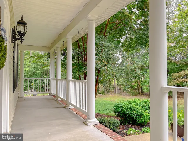 a view of a house with a barbeque gate