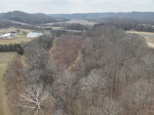 a view of mountain with lake view
