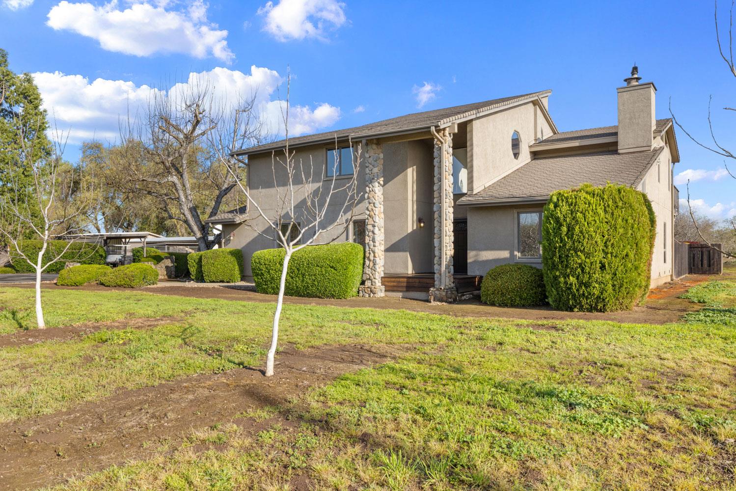 19909 Comstock Road Linden, CA 95236 - Photo 41 of 51 a view of a house with a yard