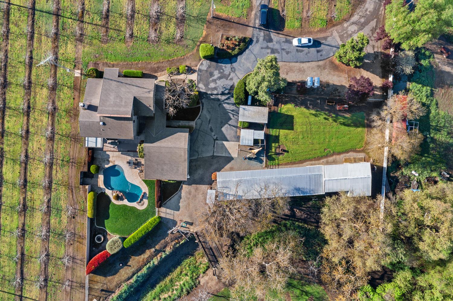 19909 Comstock Road Linden, CA 95236 - Photo 46 of 51 an aerial view of a house with a yard and outdoor seating