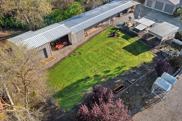 a view of a yard with an outdoor space