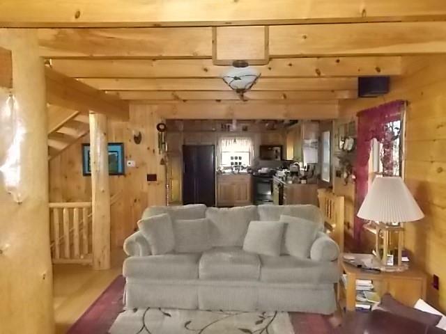 155 Dutch Street Oak Ridge, PA 16245 - Photo 13 of 23 a living room with furniture and a chandelier