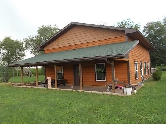 155 Dutch Street Oak Ridge, PA 16245 - Photo 3 of 23 a front view of a house with a yard
