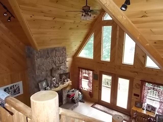 155 Dutch Street Oak Ridge, PA 16245 - Photo 21 of 23 a view of a porch with furniture and a floor to ceiling window