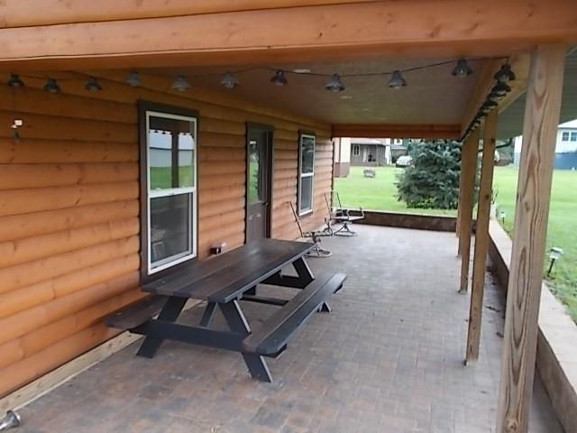 155 Dutch Street Oak Ridge, PA 16245 - Photo 6 of 23 a view of a patio with a table and chairs