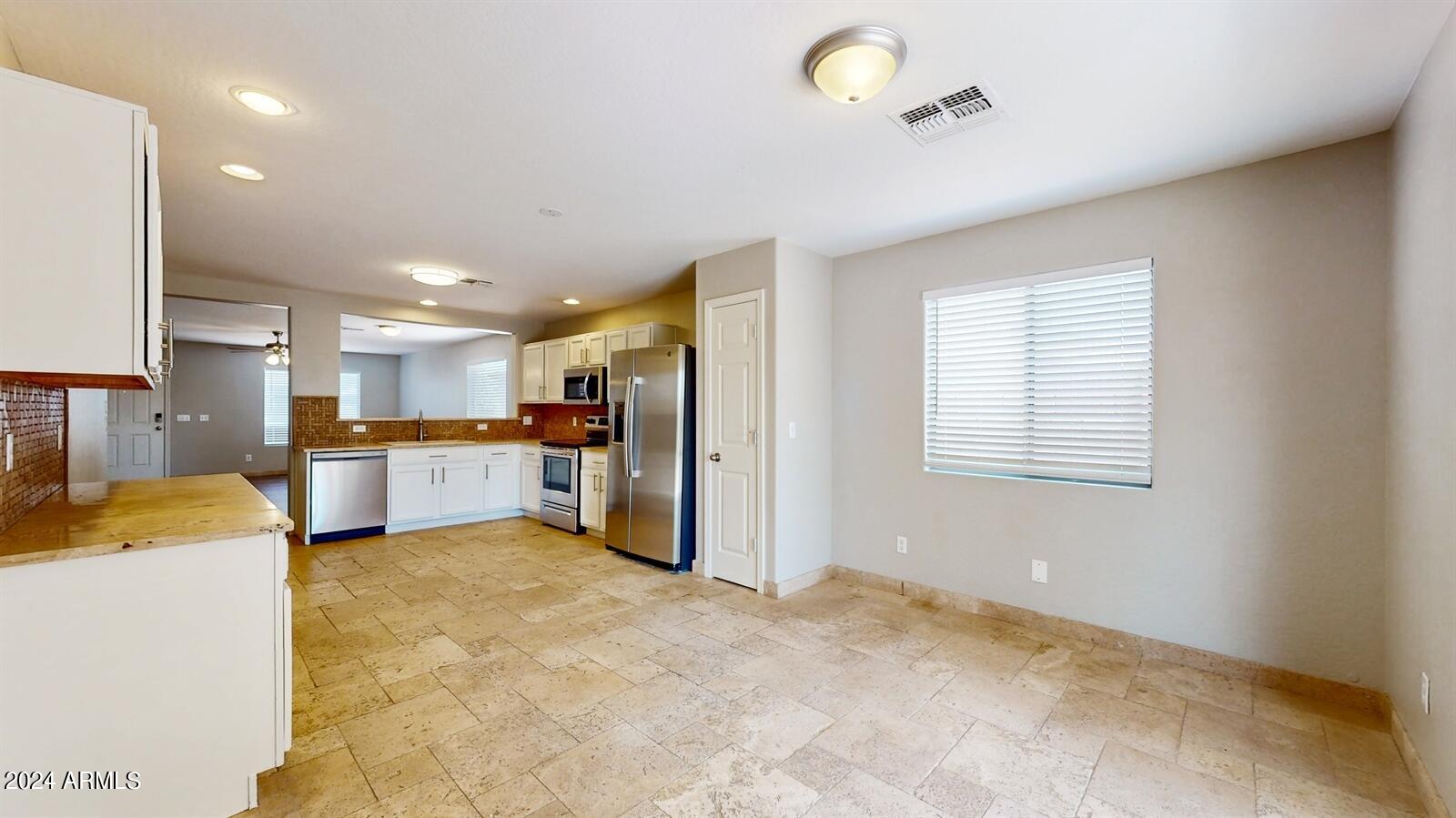 16209 West Hearn Road Surprise, AZ 85379 - Photo 9 of 26 09_16209WHearnRd_2009_Large
