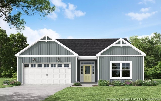 117 Country Ridge Lane Carthage, NC 28327 - Photo 1 of 2 a front view of a house with a yard