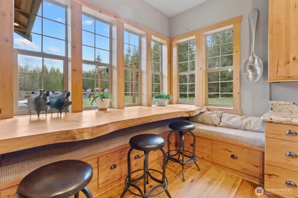 a living room with furniture fireplace and flat screen tv