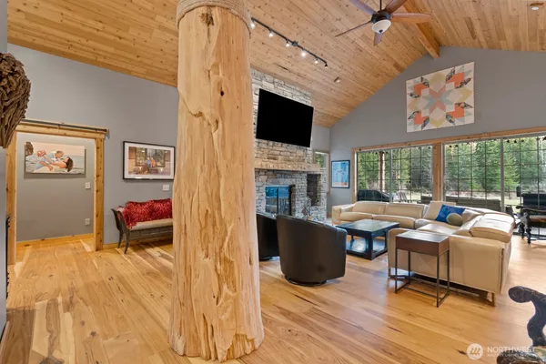 a large kitchen with a table and chairs