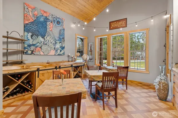 a living room with furniture rug and window