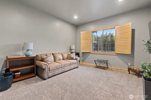 a en suite bathroom with a sink and mirror