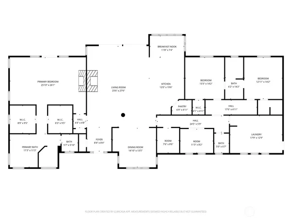 a living room with fireplace furniture and a flat screen tv