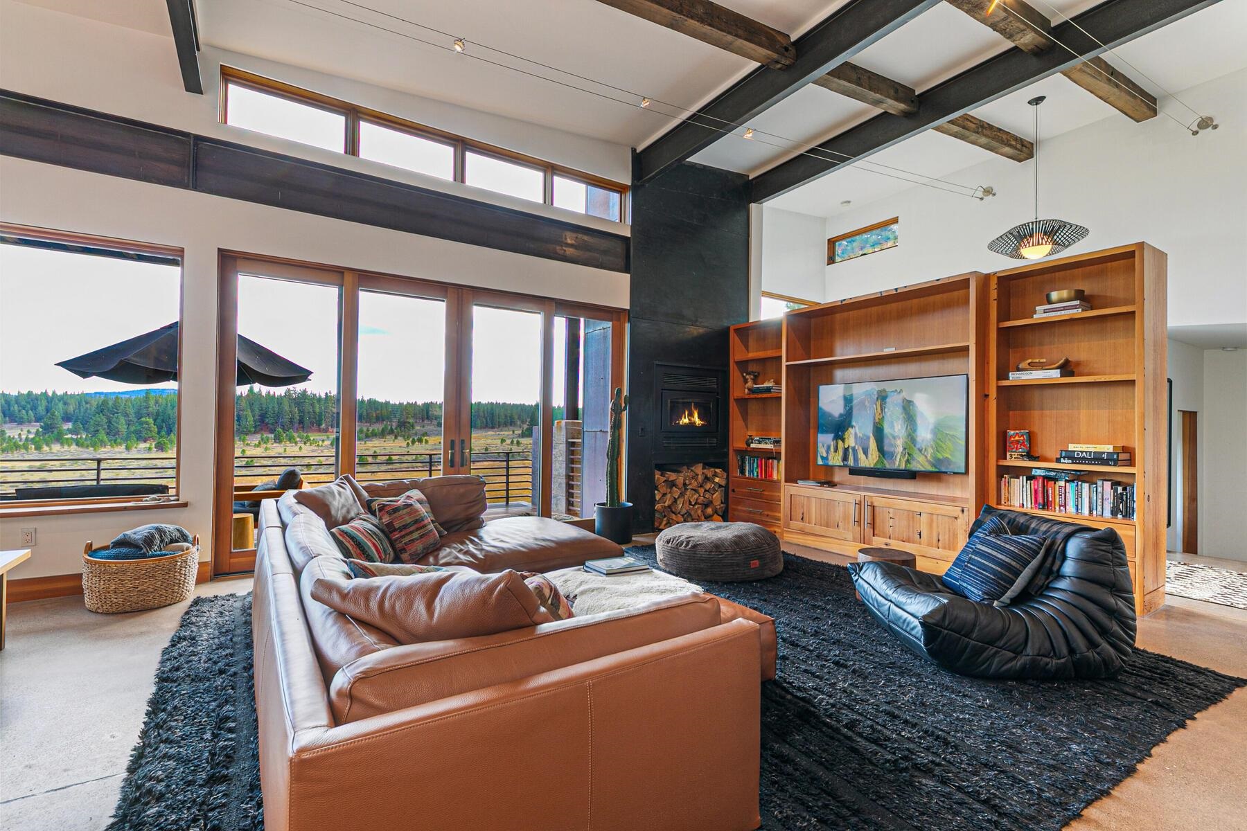 14761 Dry Creek Court Truckee, CA 96161 - Photo 24 of 28 a living room with furniture and a floor to ceiling window