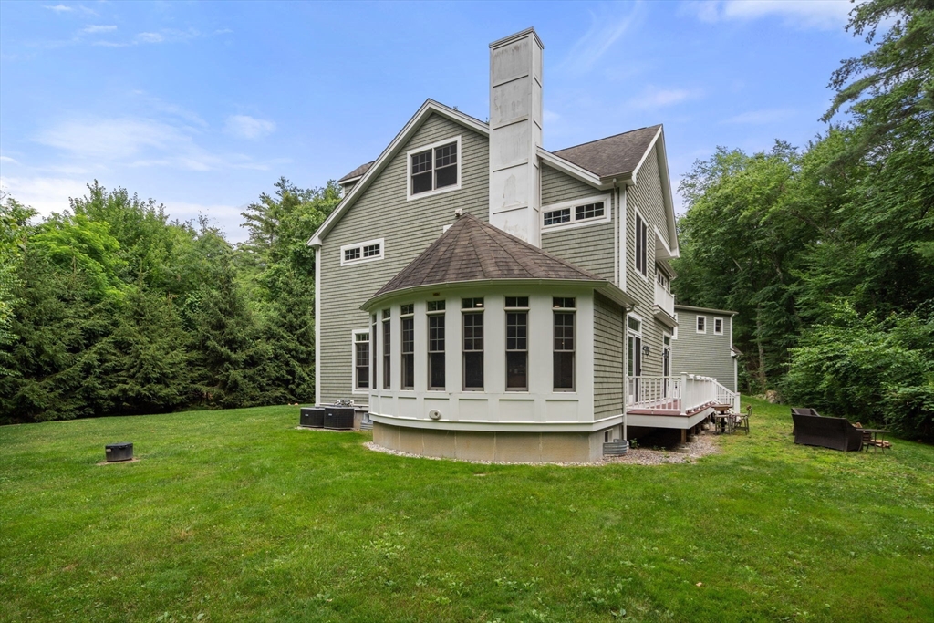 24 Wayside Inn Road Framingham, MA 01701 - Photo 4 of 38 a front view of a house with a yard
