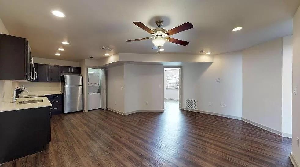 1925 Moser Avenue, Unit S1 Dallas, TX 75206 - Photo 12 of 21 a view of a kitchen with a sink a refrigerator and window