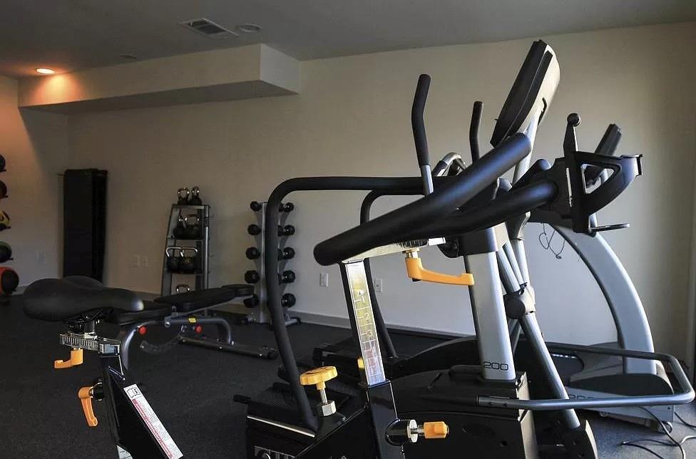 1925 Moser Avenue, Unit S1 Dallas, TX 75206 - Photo 15 of 21 a view of a room with gym equipment
