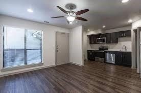 1925 Moser Avenue, Unit S1 Dallas, TX 75206 - Photo 18 of 21 a view of kitchen with kitchen island microwave and refrigerator