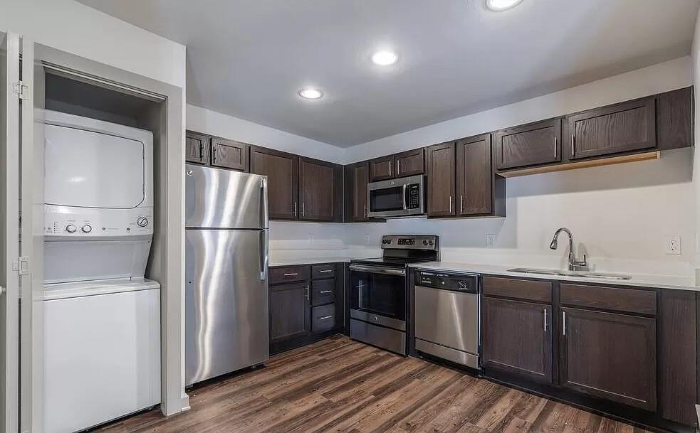 1925 Moser Avenue, Unit S1 Dallas, TX 75206 - Photo 2 of 21 a kitchen with stainless steel appliances a refrigerator stove and sink