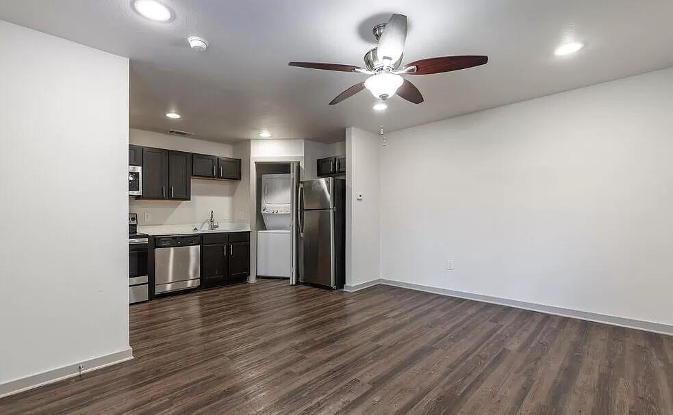 1925 Moser Avenue, Unit S1 Dallas, TX 75206 - Photo 4 of 21 a view of a kitchen with a sink and stainless steel appliances