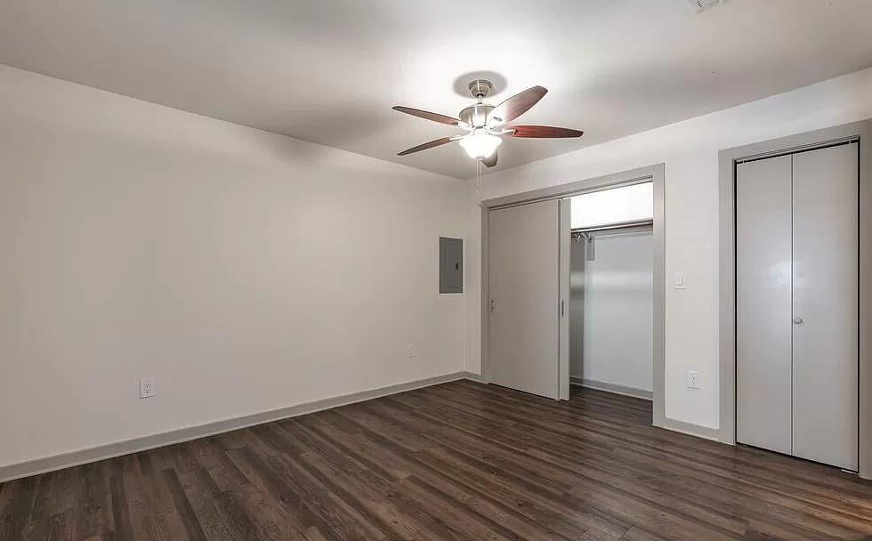 1925 Moser Avenue, Unit S1 Dallas, TX 75206 - Photo 9 of 21 a view of an empty room with wooden floor