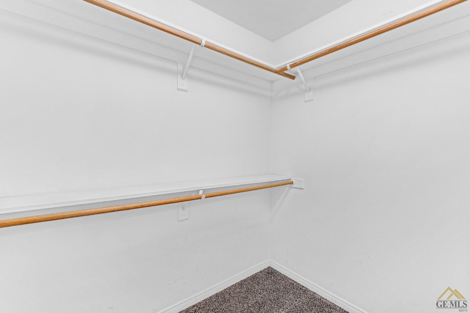 Undisclosed Address Bakersfield, CA 93312 - Photo 17 of 31 a view of small space with racks on the wall