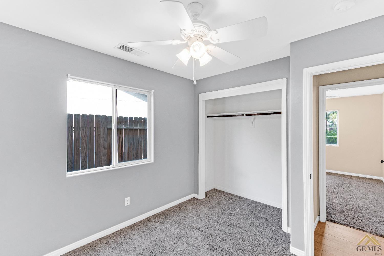 Undisclosed Address Bakersfield, CA 93312 - Photo 22 of 31 an empty room with windows and closet
