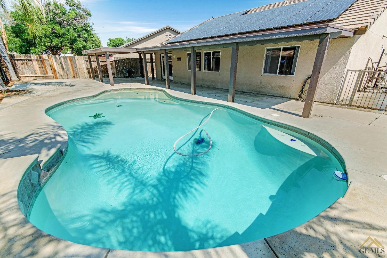 Undisclosed Address Bakersfield, CA 93312 - Photo 28 of 31 a view of a house with swimming pool