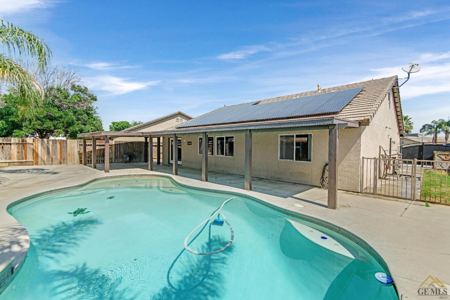 Undisclosed Address Bakersfield, CA 93312 - Photo 29 of 31 a view of a house with backyard