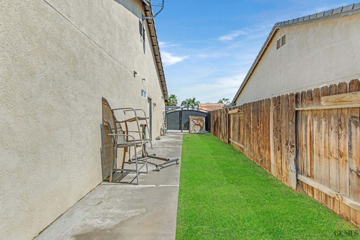 Undisclosed Address Bakersfield, CA 93312 - Photo 31 of 31 a view of a patio with backyard