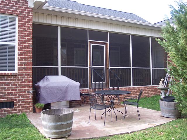 5013 Paddy Trace Spring Hill, TN 37174 - Photo 14 of 14 RELAX IN YOUR BEAUTIFUL AND PRIVATE SCREEN ROOM, WITH PATIO FOR SUMMERTIME COOKOUTS!