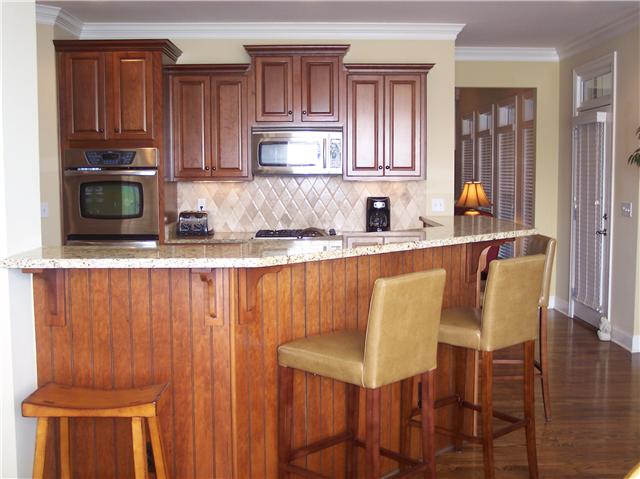 5013 Paddy Trace Spring Hill, TN 37174 - Photo 8 of 14 THE KITCHEN HAS AN OPEN FEEL, AND IS PERFECT FOR ENTERTAINING GUESTS!